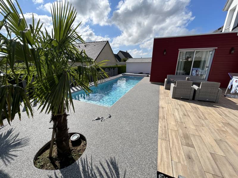 Construction d'une piscine en kit avec terrasse, près de saint romain de colbosc